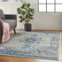 5' X 7' Ivory And Light Blue Floral Medallion Distressed Area Rug